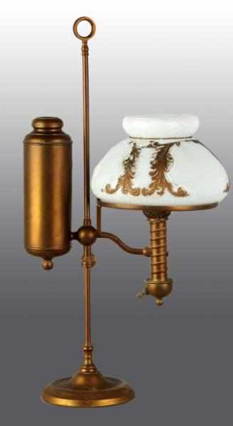 Appraisal: Brass Student Lamp Description With large kerosene canister and white