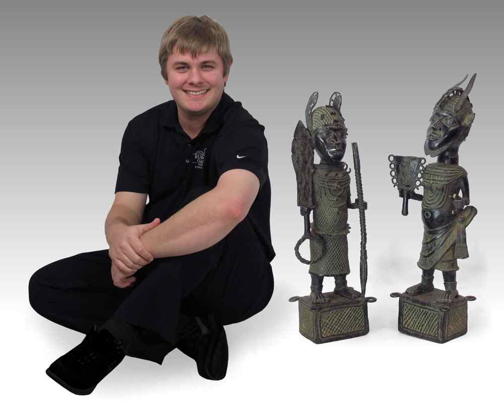 Appraisal: TWO AFRICAN BRONZE WARRIOR FIGURAL SCULPTURES Approx '' h x