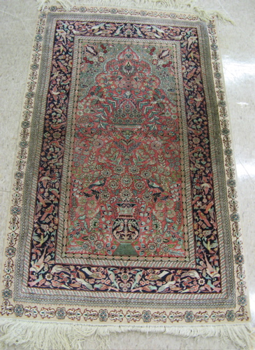 Appraisal: SILK PRAYER RUG Sino-Persian having a rose ground prayer mehrab