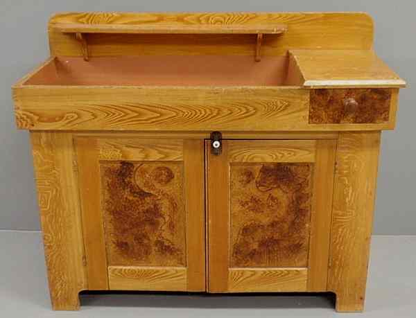 Appraisal: Pennsylvania dry sink c with yellow paint decoration and dovetailed