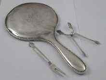 Appraisal: A pair of silver Georg Jensen sugar tongs together with