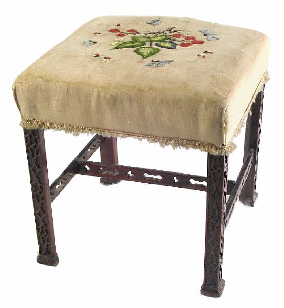 Appraisal: A George III style blind fret carved mahogany stool stains