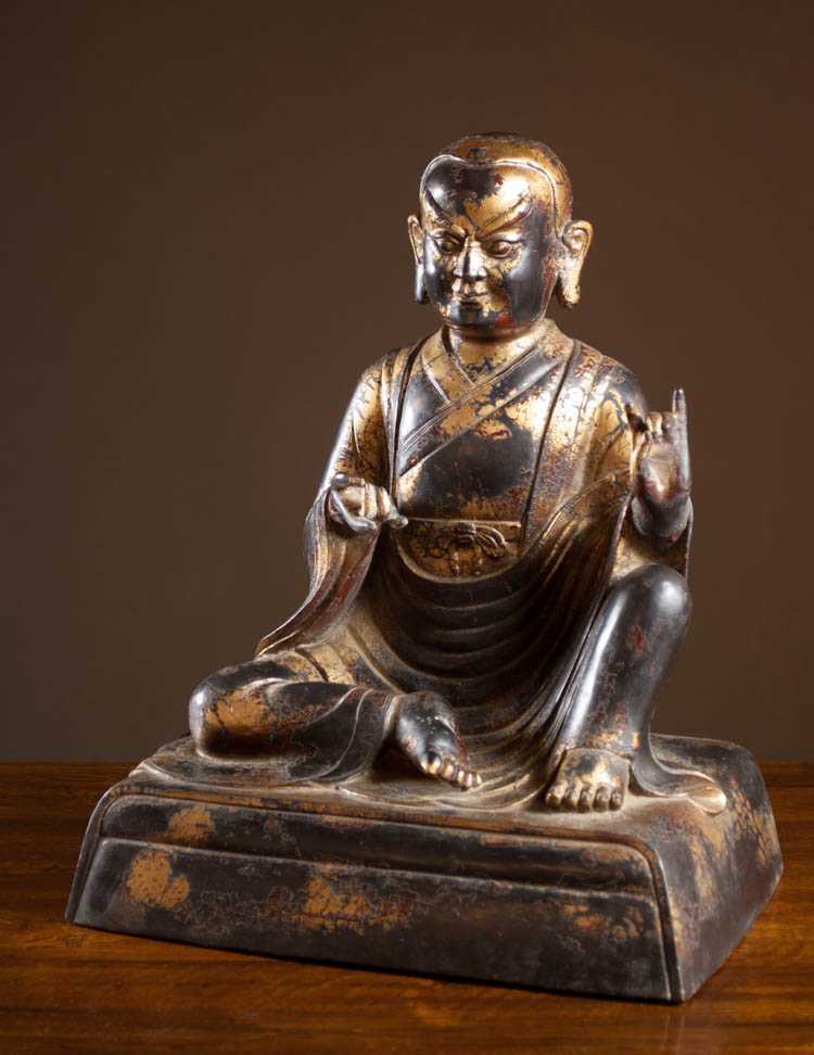 Appraisal: CHINESE QING PARCEL GILT BRONZE BUDDHA FIGURE seated with crossed