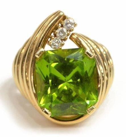 Appraisal: Estate kt yellow gold peridot and diamond cocktail ring comprising