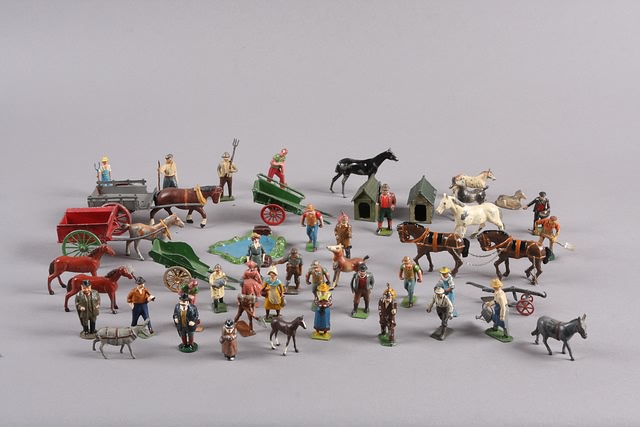 Appraisal: Lot of approximately metal figures horses carts and animals by