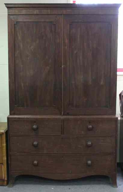 Appraisal: A Regency mahogany linen press with moulded cornice fitted sliding