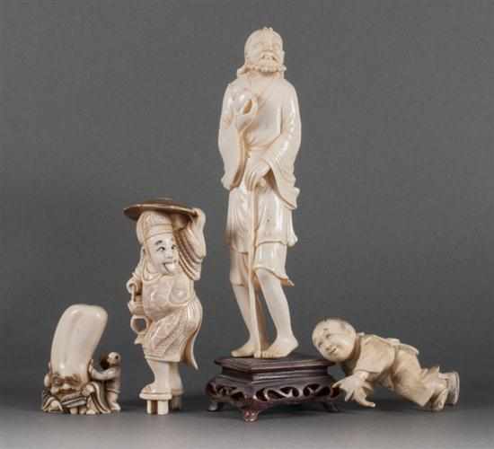 Appraisal: Four Japanese carved ivory figures man holding gourd - mounted