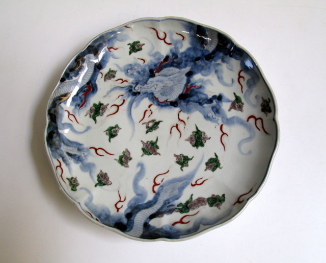 Appraisal: JAPANESE IMARI DRAGON PLATE lobed and scalloped with hand enameled