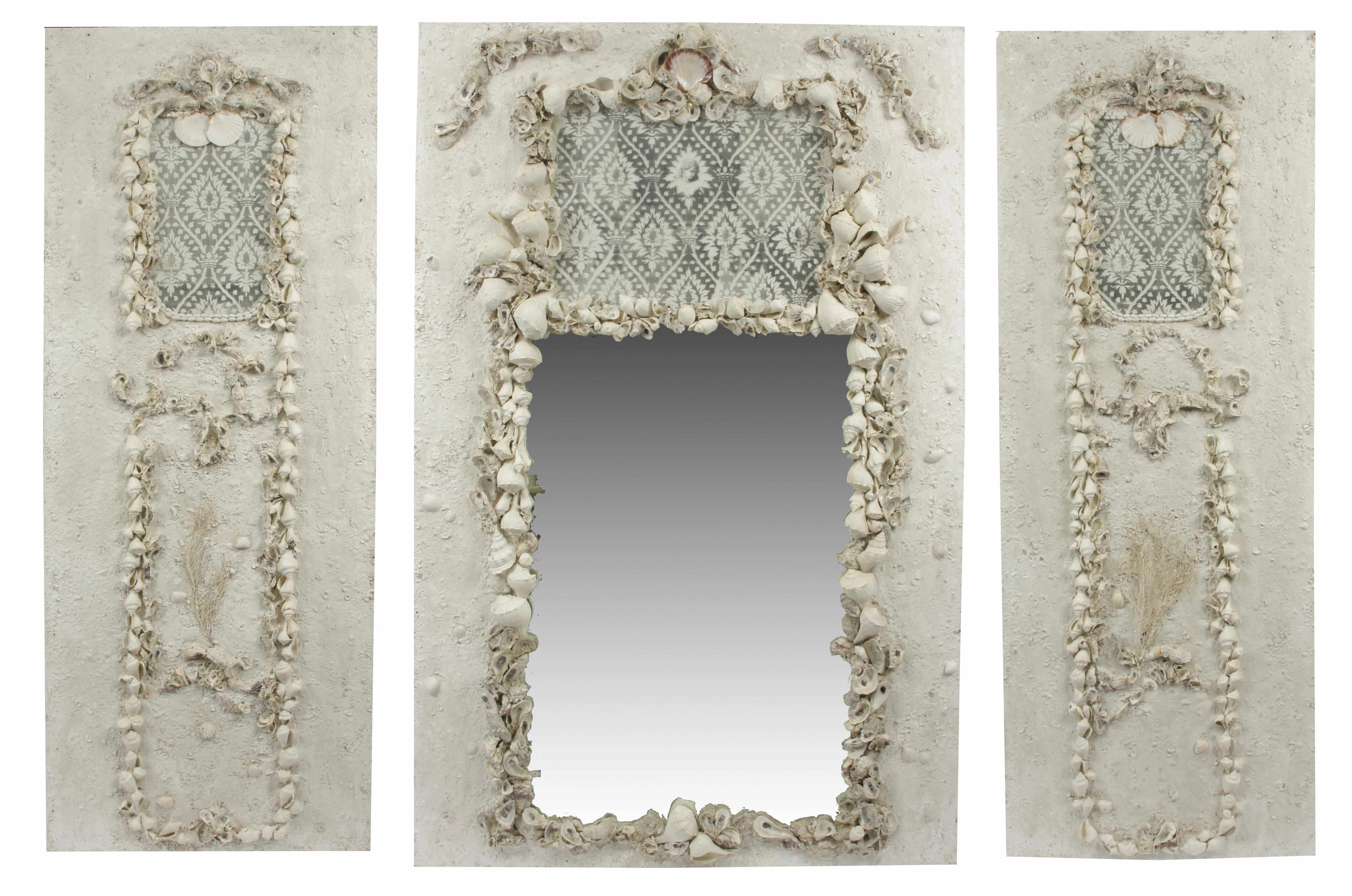 Appraisal: A Grotto style mirrored boiserie panel Comprising a central panel