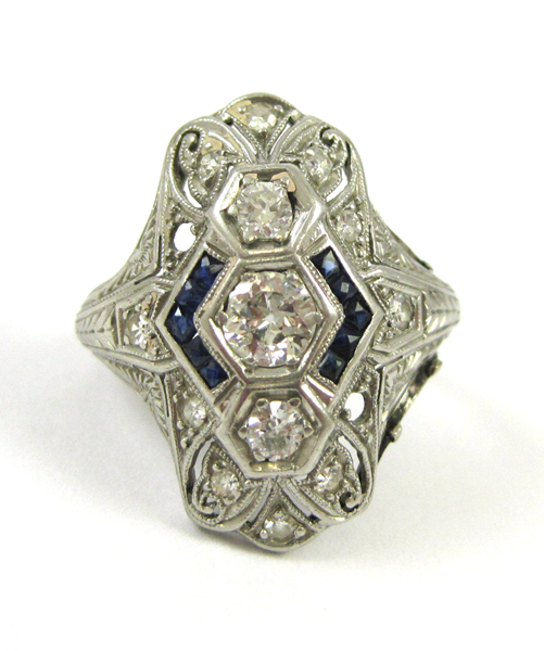 Appraisal: DIAMOND SAPPHIRE AND PLATINUM RING The art deco style ring