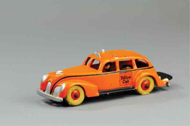 Appraisal: HUBLEY YELLOW CAB Cast iron stenciled cab painted in orange