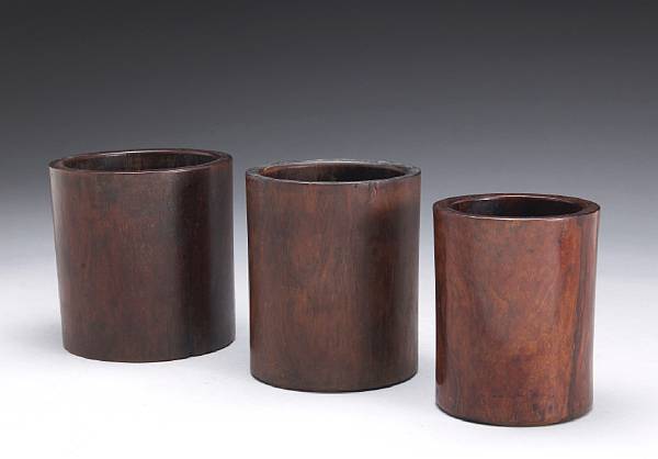 Appraisal: Three huanghuali brush pots th Century All in simple cylindrical