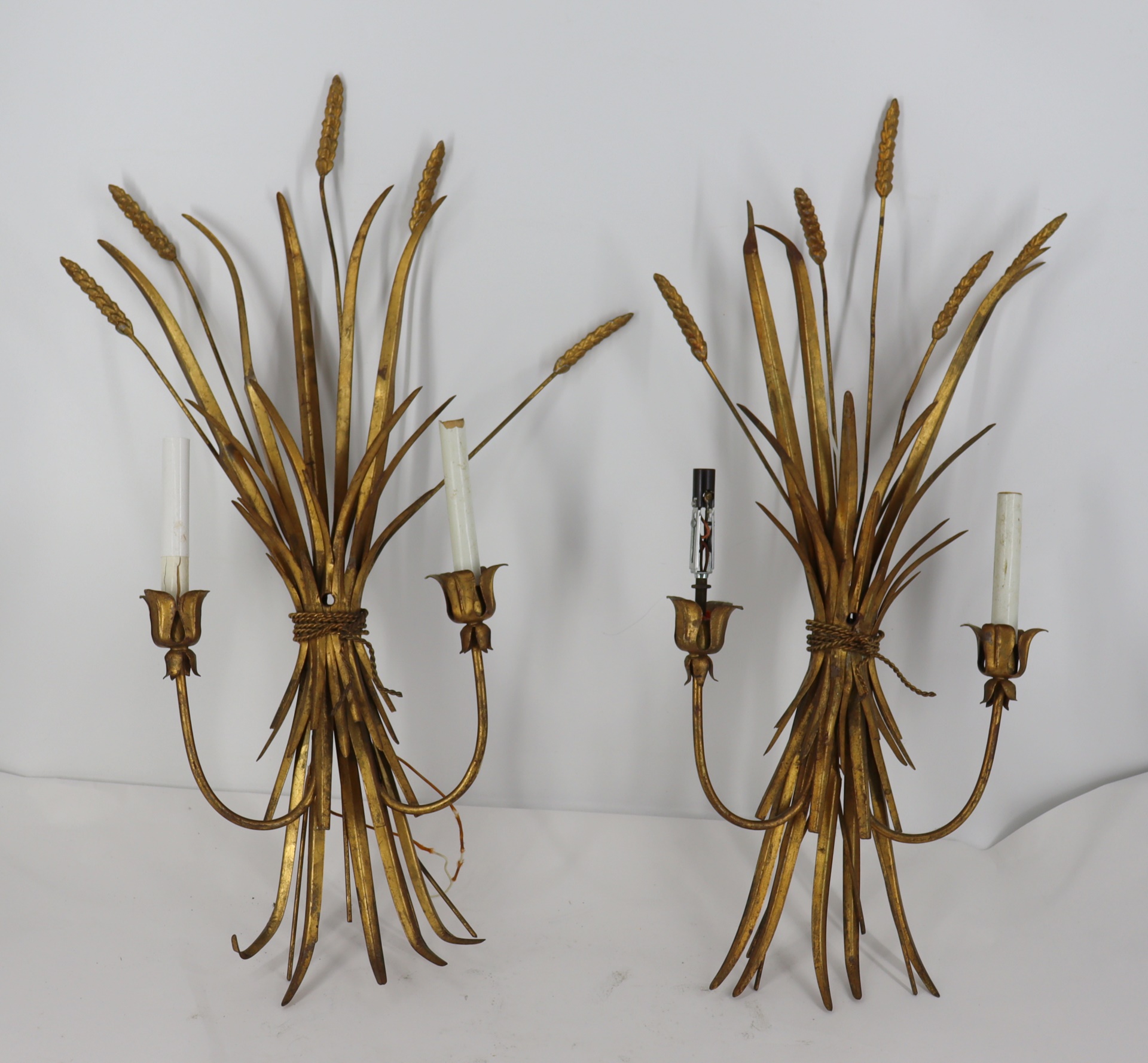 Appraisal: MIDCENTURY PAIR OF GILT METAL WHEAT SHEAF SCONCES From a