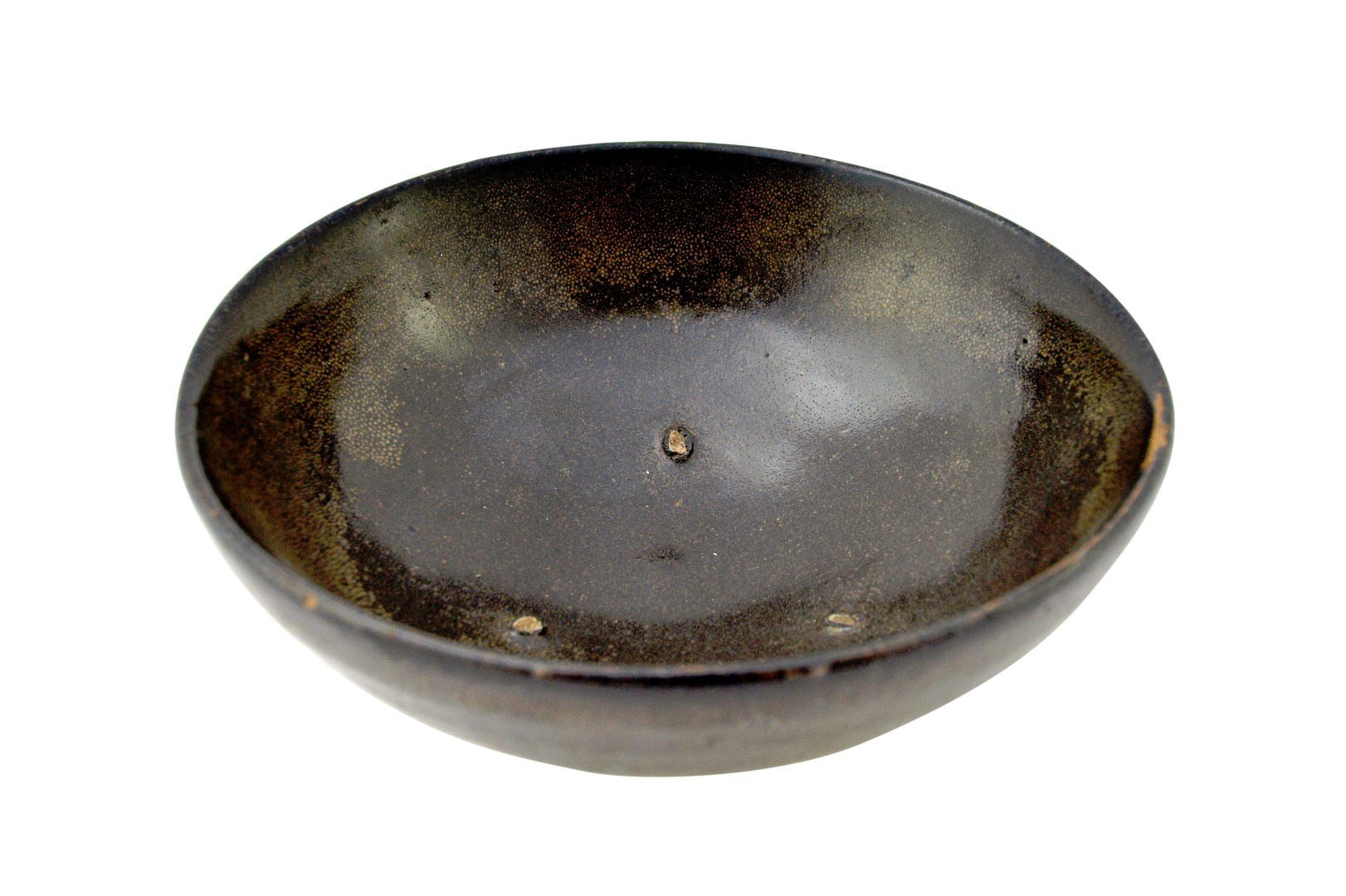 Appraisal: A Chinese black-glazed bowl Song Dynasty of shallow form covered