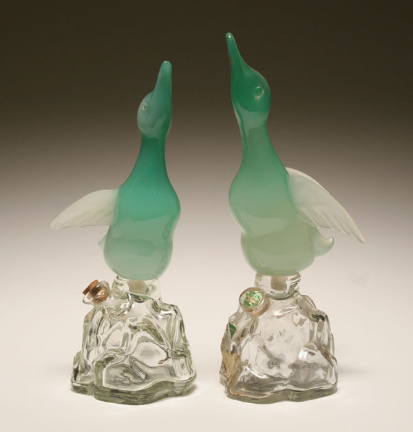 Appraisal: Murano glass opaline green bodied duck decanters for Luxardo and