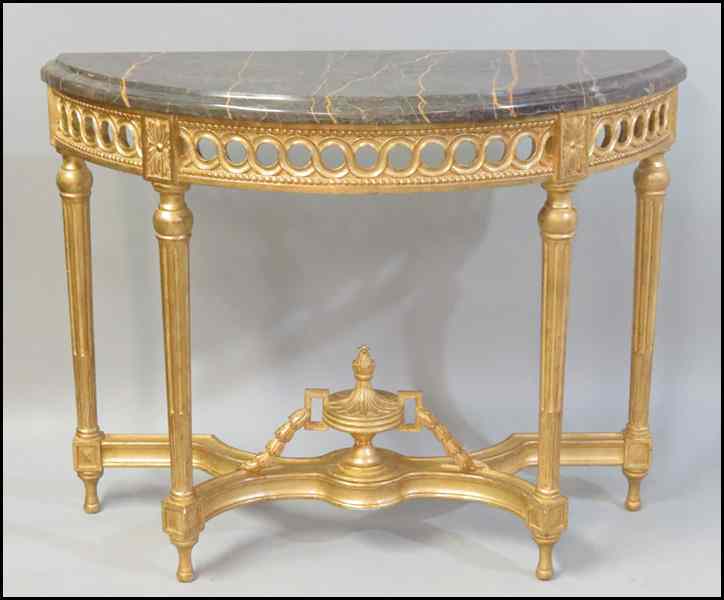 Appraisal: PAIR OF GILTWOOD DEMILUNE CONSOLE TABLES Both with marble tops