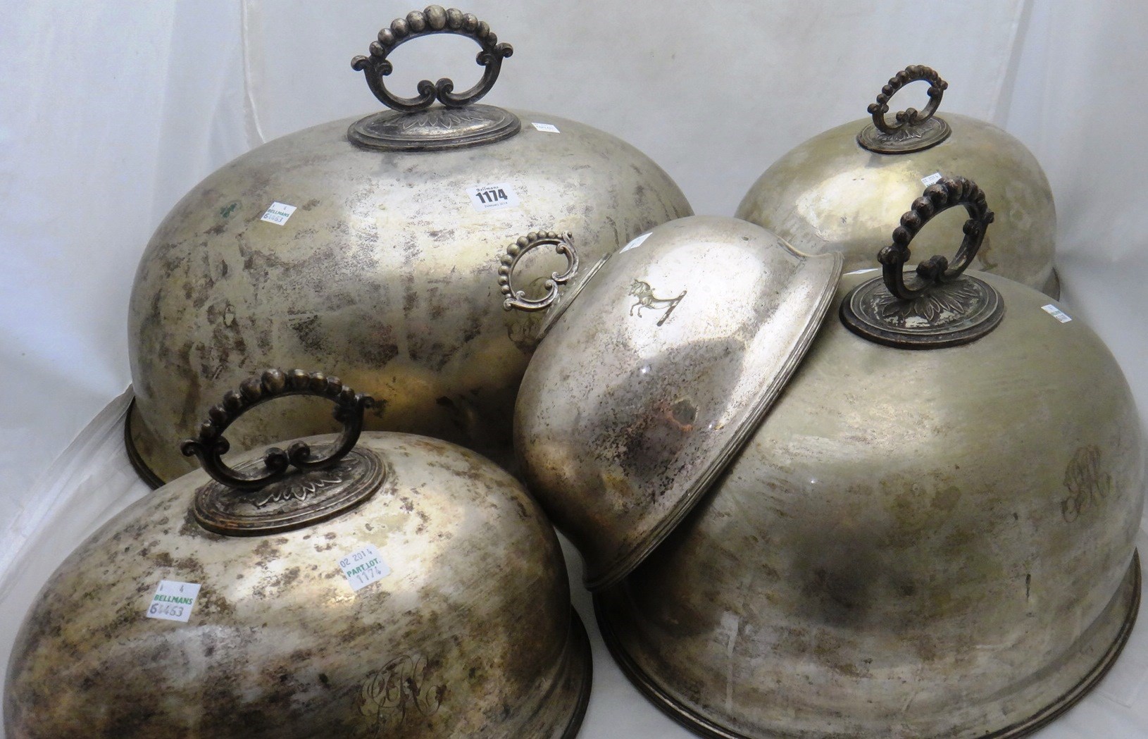 Appraisal: A set of five graduated oval plated meat domes with