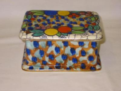 Appraisal: A BURSLEM POTTERY BOX AND COVER of oblong form painted