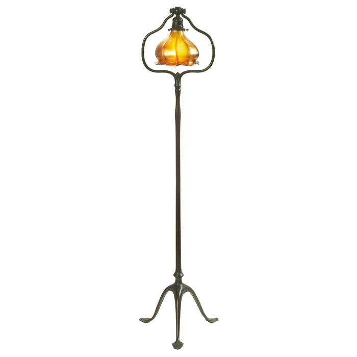 Appraisal: Tiffany Studios floor lamp bronze three footed base holding a