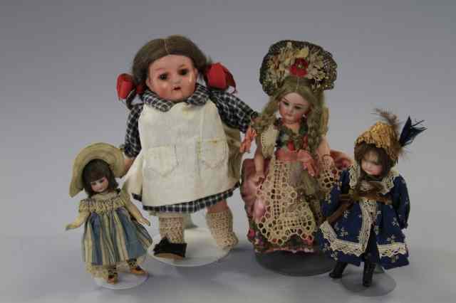 Appraisal: LOT OF FOUR SMALL DOLLS Largest doll is an all