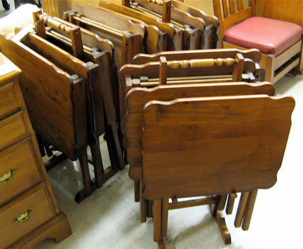 Appraisal: THREE SETS OF FOUR FOLDING TV TABLES each table of