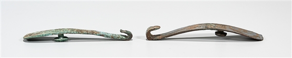 Appraisal: Two Chinese bronze hooks with incised stipled and parcel-gilt design