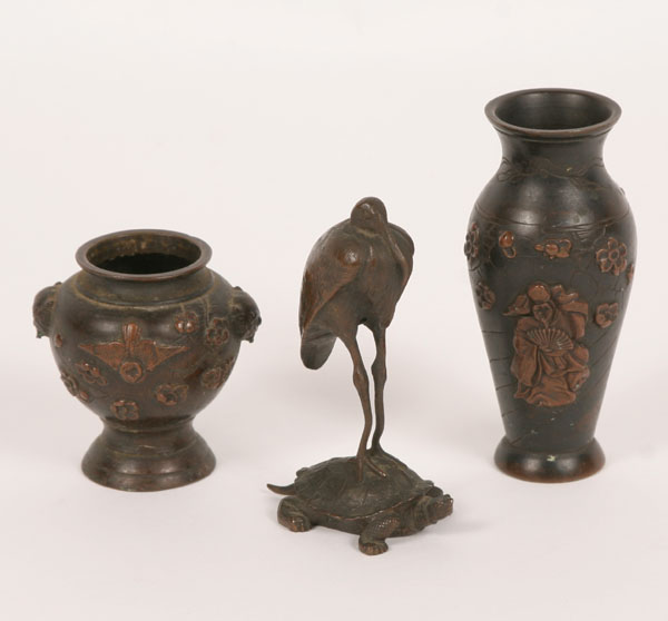 Appraisal: Two miniature bronze vases with embossed floral and figural detail