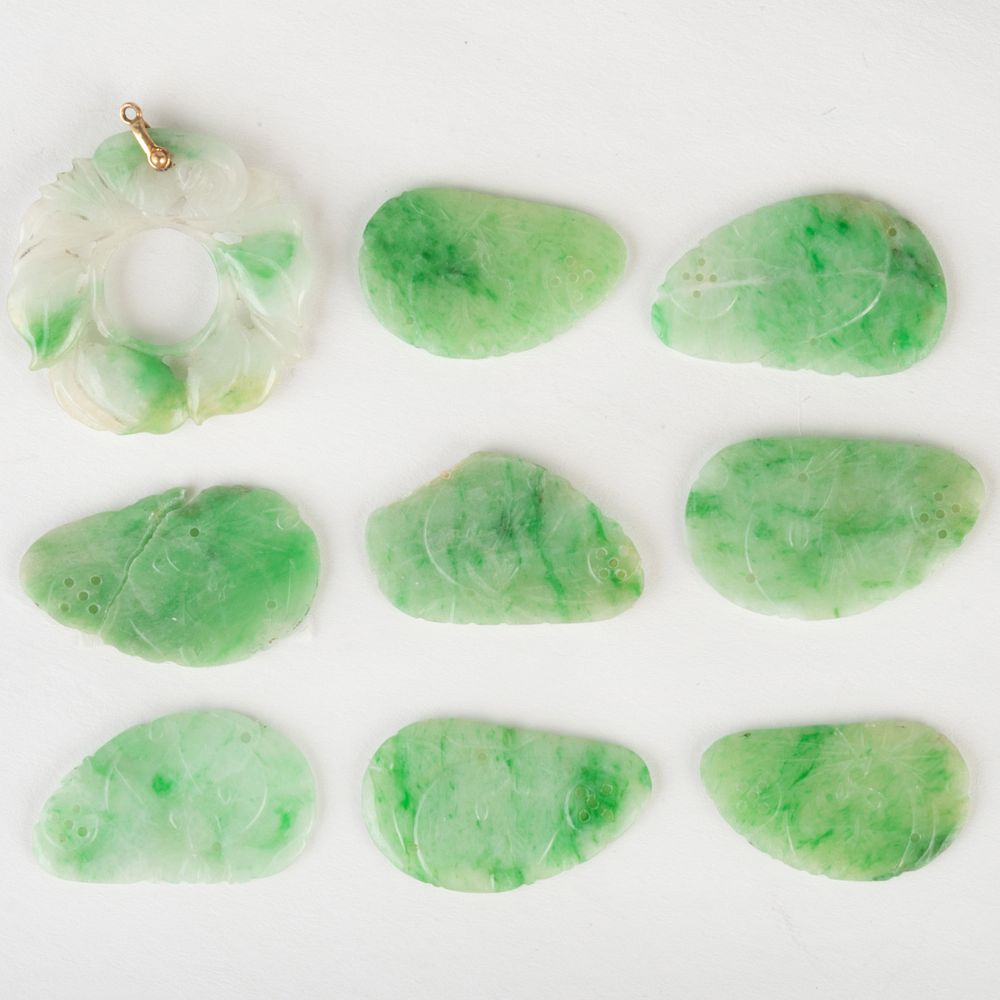 Appraisal: Group of Carved Jade Pieces Eight thin wing shaped pierced