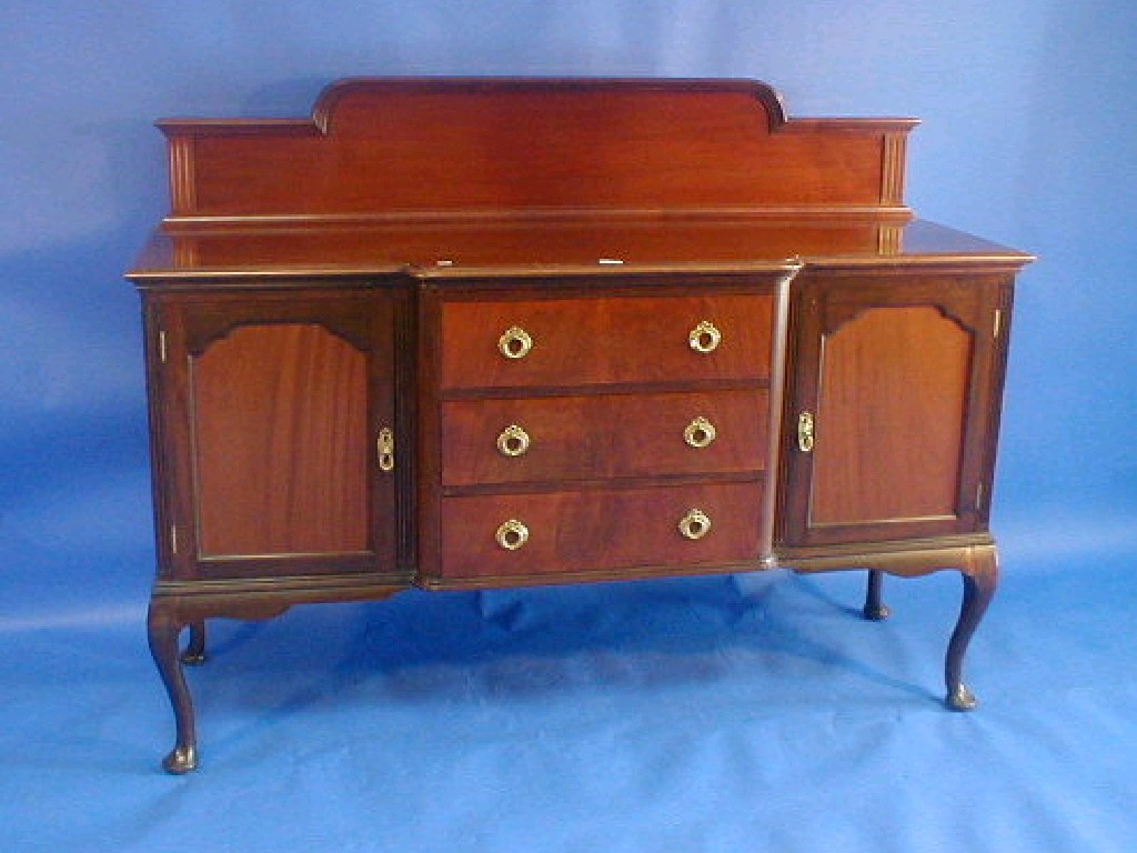 Appraisal: An Edwardian mahogany breakfront sideboard on cabriole legs