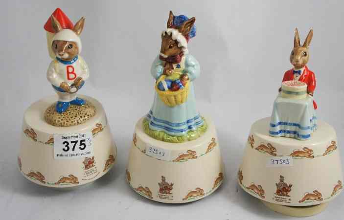 Appraisal: Royal Doulton Bunnykins Musical Boxes Easter Parade DB Astroman DB