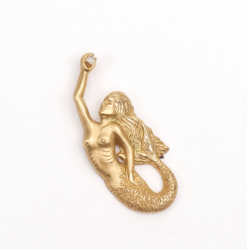 Appraisal: WYLAND GOLD MERMAID PENDANT k yellow gold figure of a