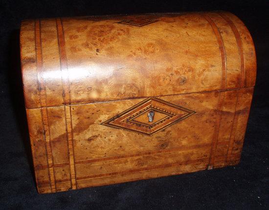 Appraisal: A mid Victorian dome top tea-caddy the dome top and