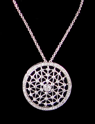 Appraisal: k WHITE GOLD AND DIAMOND DISC PENDANT FEATURING A Ct