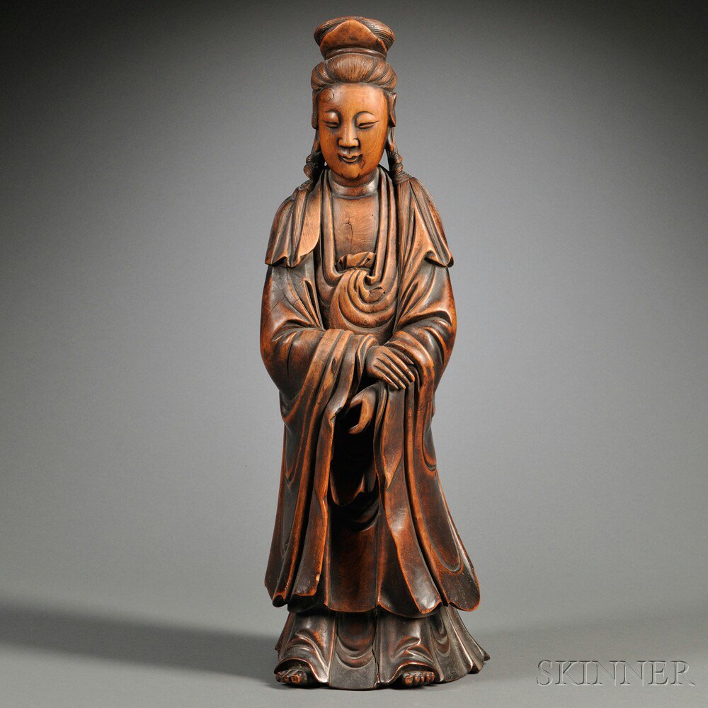 Appraisal: Wood Figure of Guanyin China th century the bodhisattva depicted