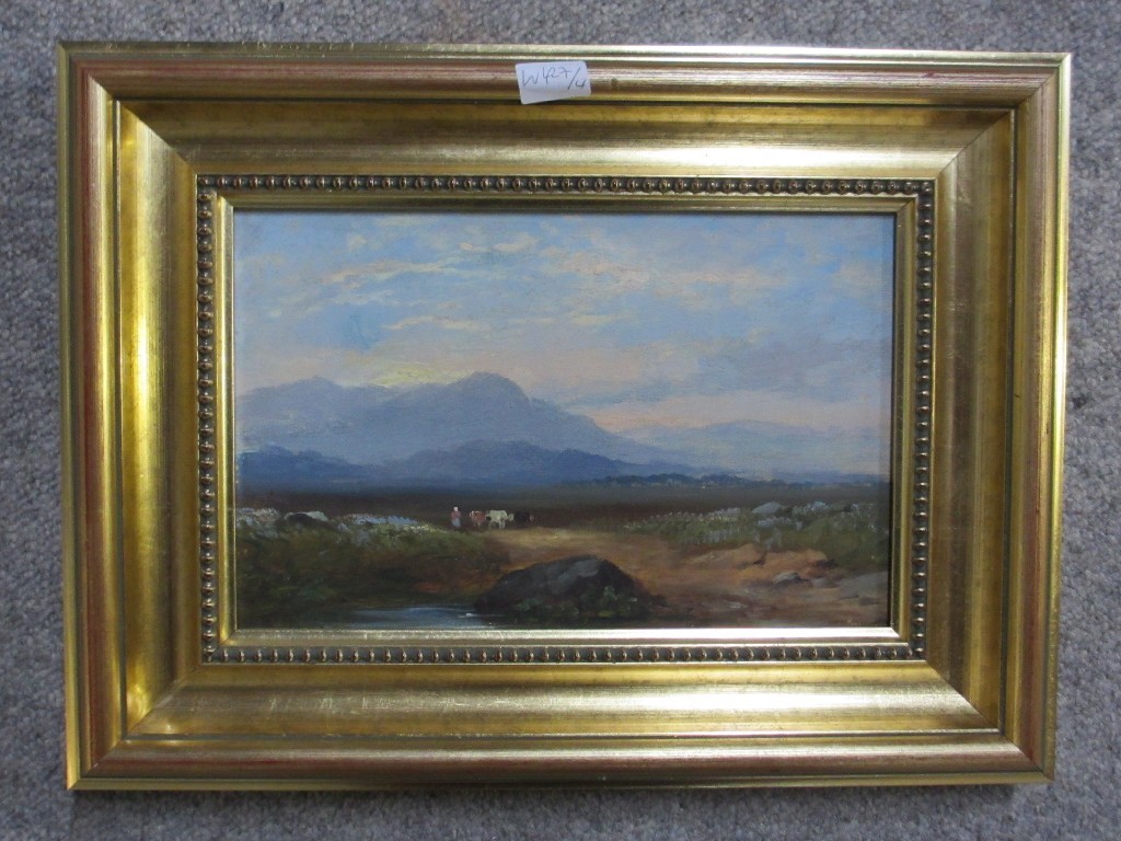 Appraisal: Oil on canvas Highland landscape with a figure and cattle