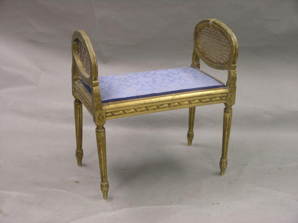 Appraisal: A French giltwood piano stool Louis XV style with canework