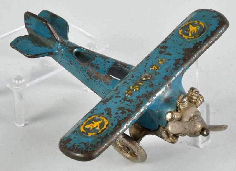 Appraisal: Cast Iron Arcade UX Airplane Toy Description American Embossed UX