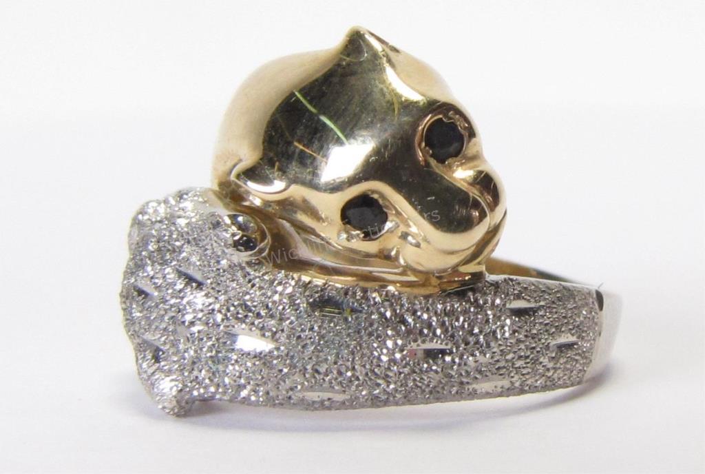 Appraisal: A K yellow and white gold panther by-pass fashion ring