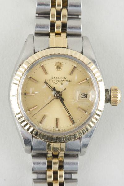 Appraisal: Lady's Rolex Oyster Perpetual Date with gold bezel and central