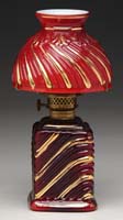 Appraisal: SCARCE MINI LAMP S - Dark red cased glass with