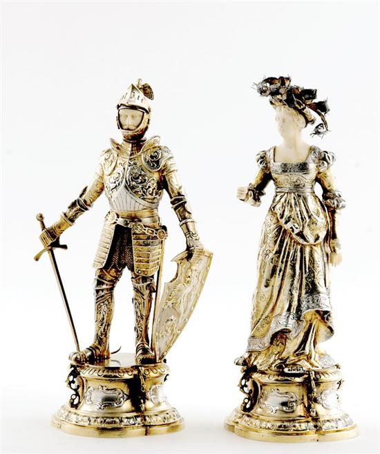 Appraisal: German vermeil silver and ivory lady and knight figures circa