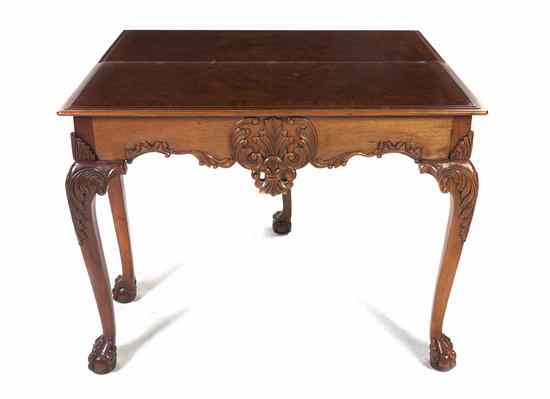 Appraisal: A Chippendale Style Flip-Top Games Table having a rectangular top