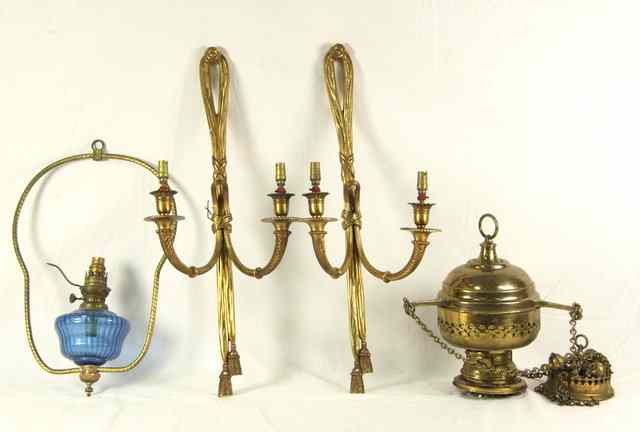 Appraisal: A pair of gilt brass wall lights of Regency design