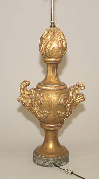 Appraisal: An Italian Baroque style giltwood urn th century The footed