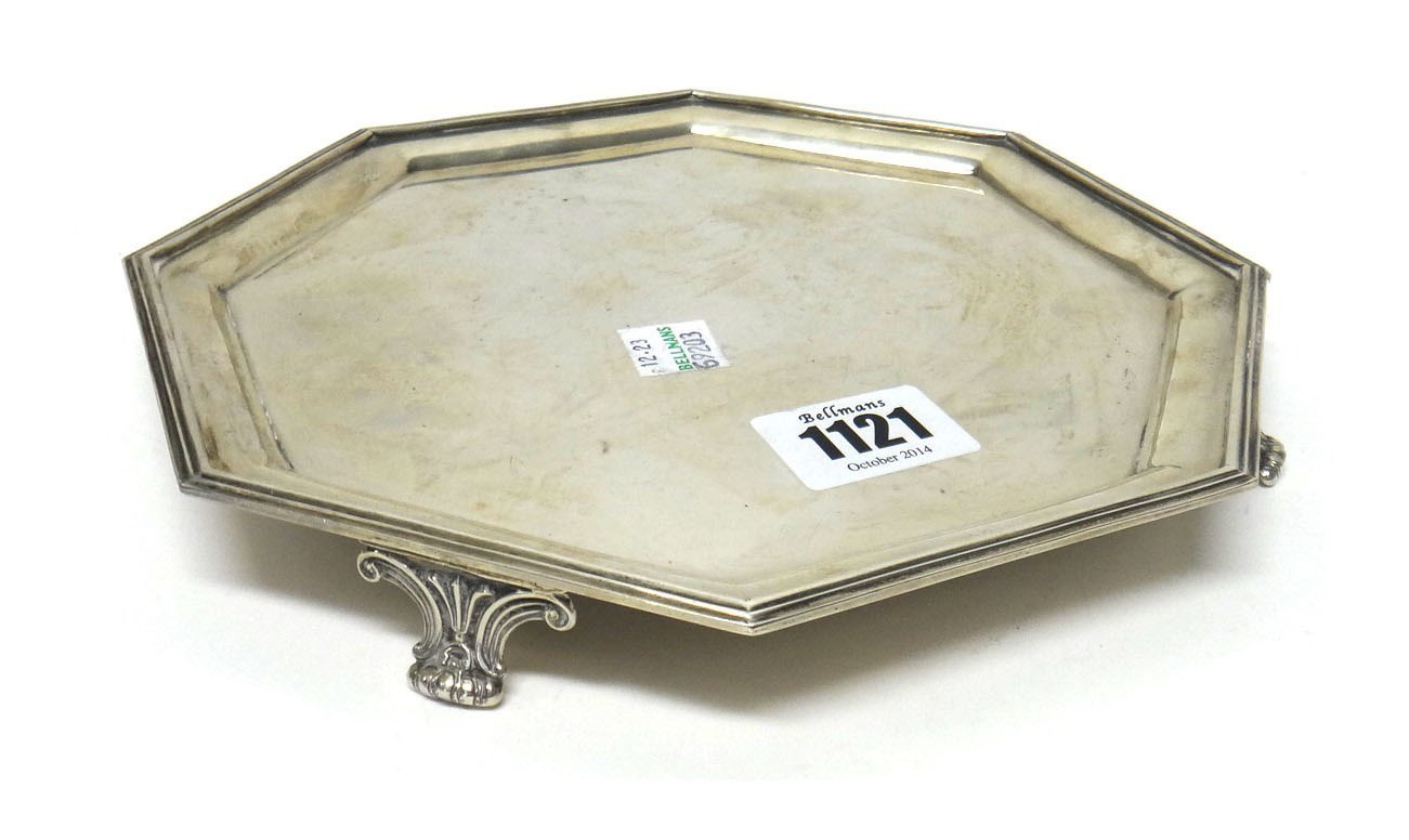 Appraisal: A silver octagonal salver with a reeded rim raised on