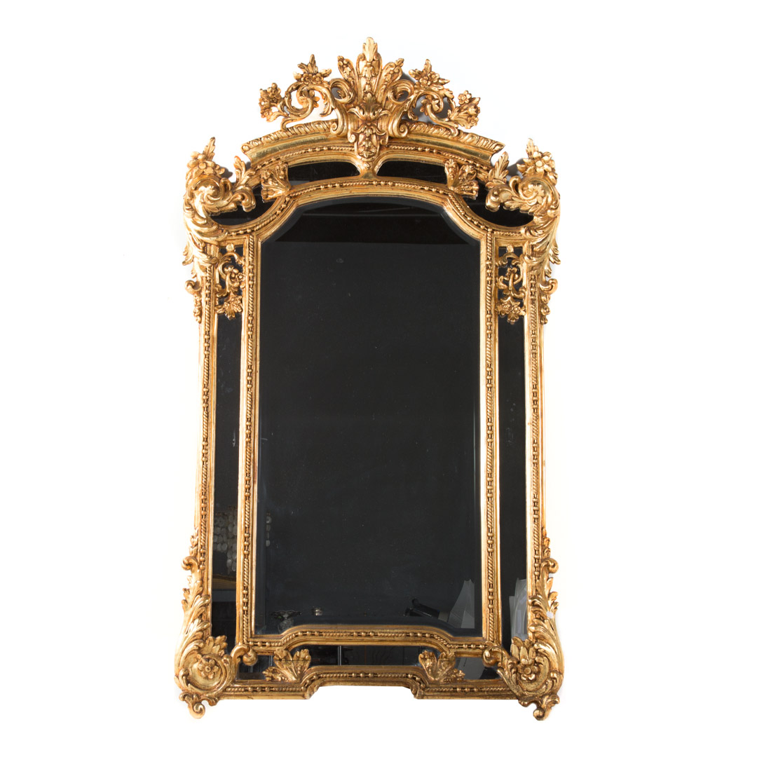 Appraisal: Regence style gilded composition mirror th century center beveled mirror