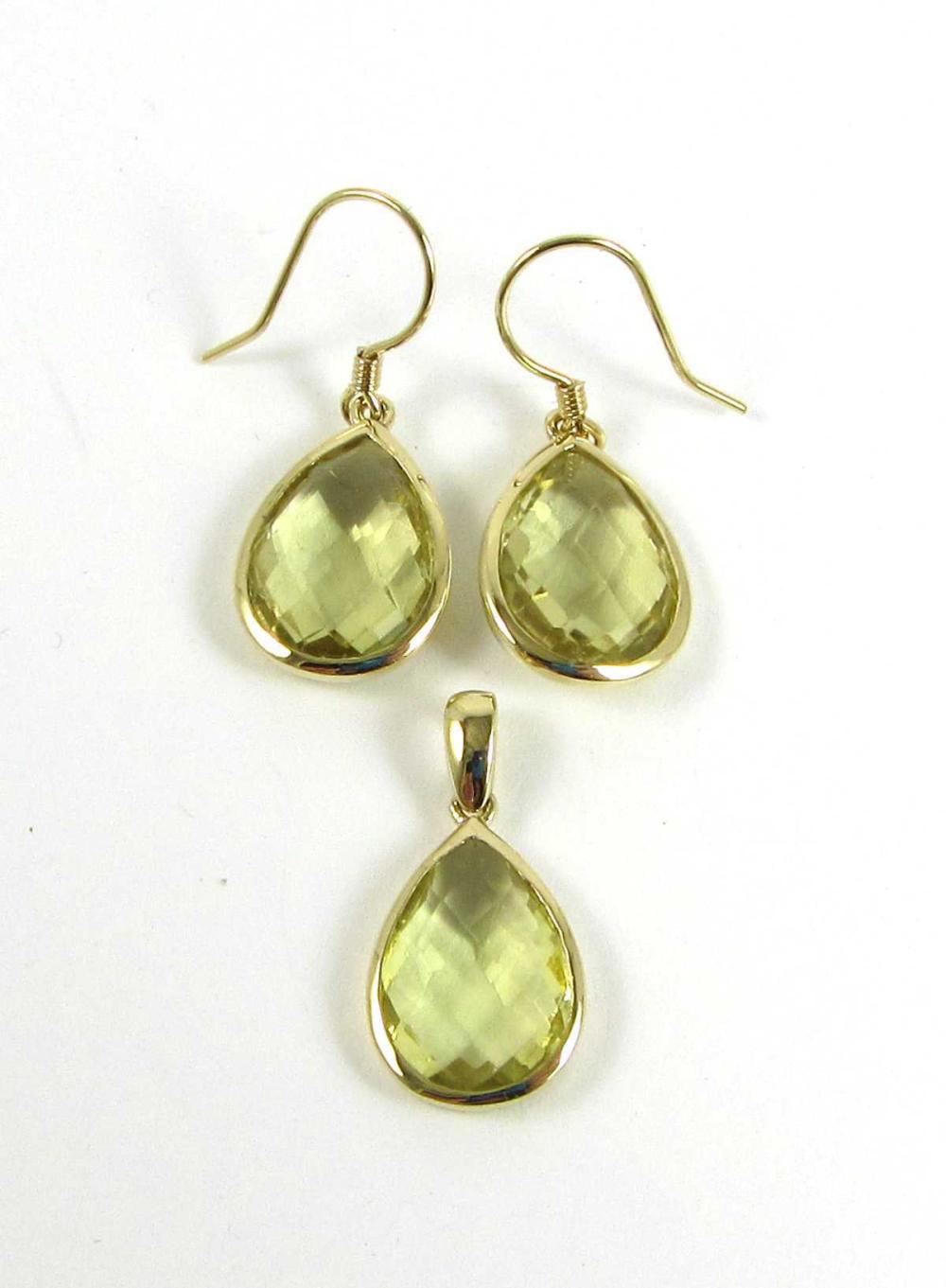 Appraisal: CITRINE AND FOURTEEN KARAT GOLD EARRING AND PENDANT SET including