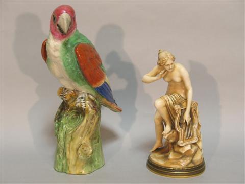 Appraisal: TWO CONTINENTAL PORCELAINS Comprising a model of a parrot perched