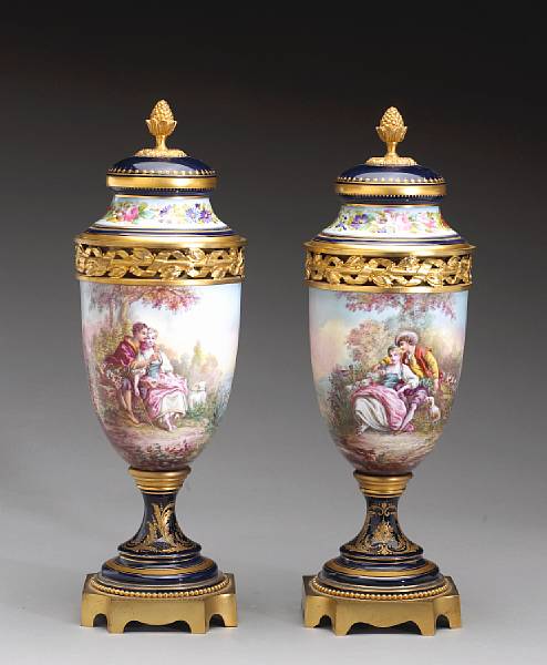 Appraisal: A pair of S vres style gilt bronze mounted porcelain