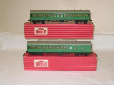 Appraisal: Two Hornby Dublo Suburban coaches comprising and boxed E Illustrated